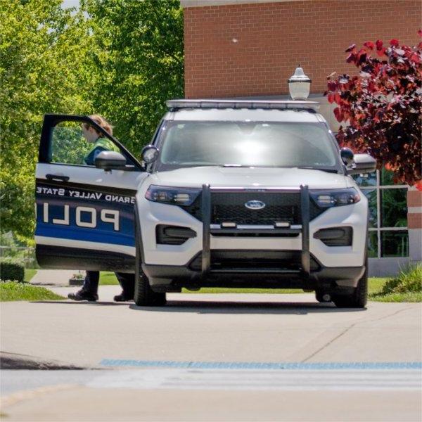 A GV police officer waiting to facilitate traffic